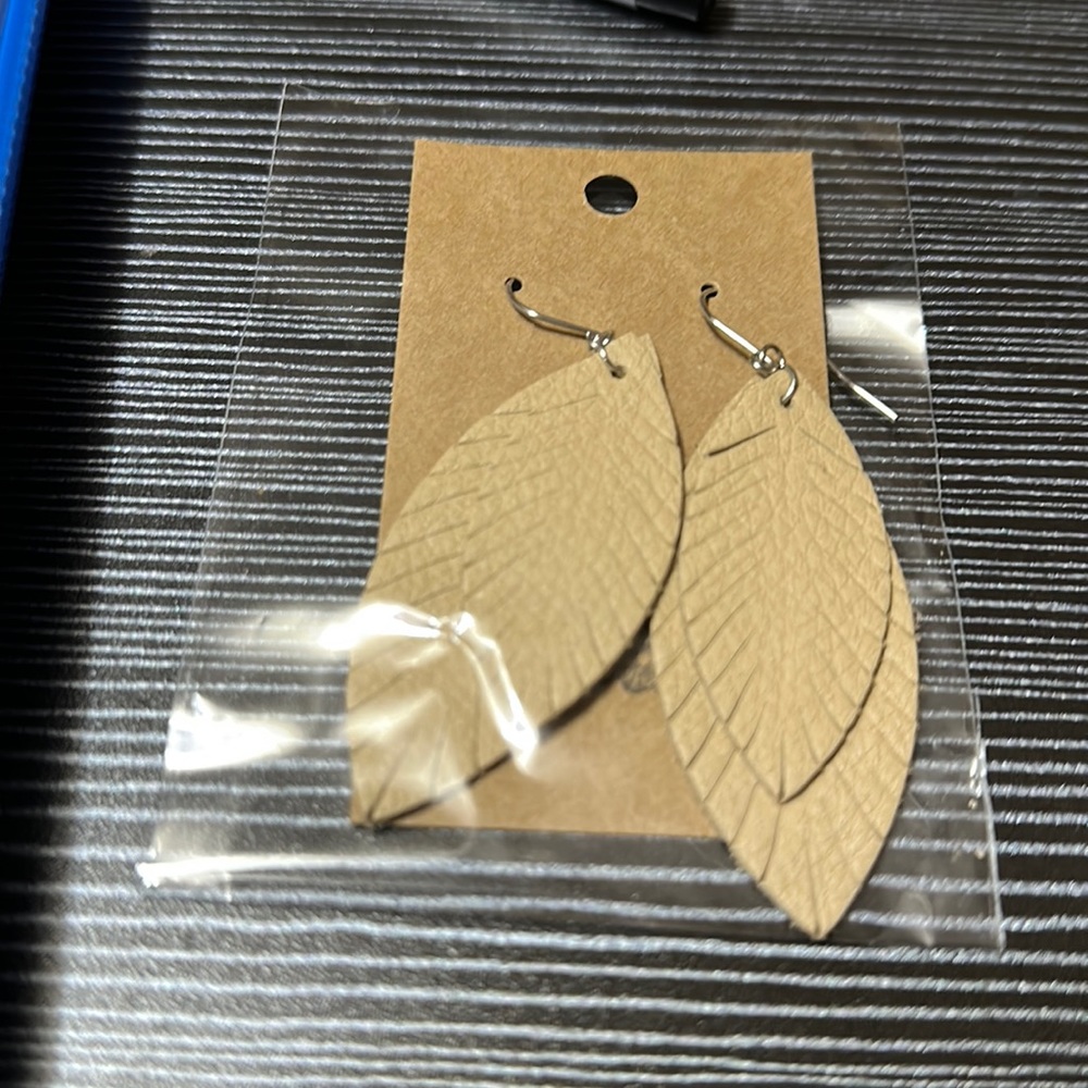 Beautiful beige/tan “leaf” earrings